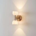 Goldene wandleuchte mit opalglas - Nysséa