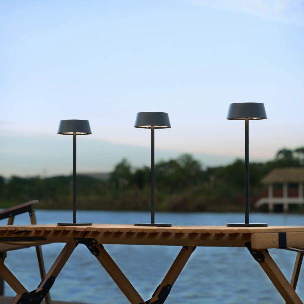 Schwarze kabellose LED-Tischlampe mit...