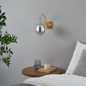 Goldene bogenförmige LED-Wandleuchte mit hängender ovaler Kugel - Nuvéo